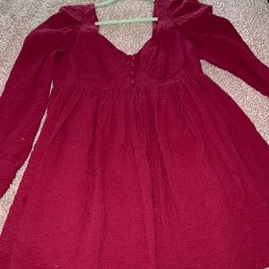 Long sleeved, maroon baby doll dress